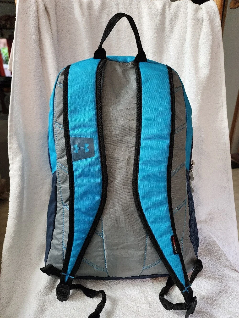M.169- Under Armour Storm Backpack, blue teal, USED